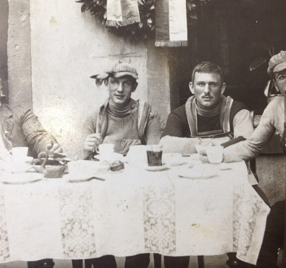 Cyclists in merino jerseys sitting at the table